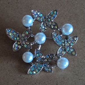 Elegant Silver Butterfly Brooch with Pearls